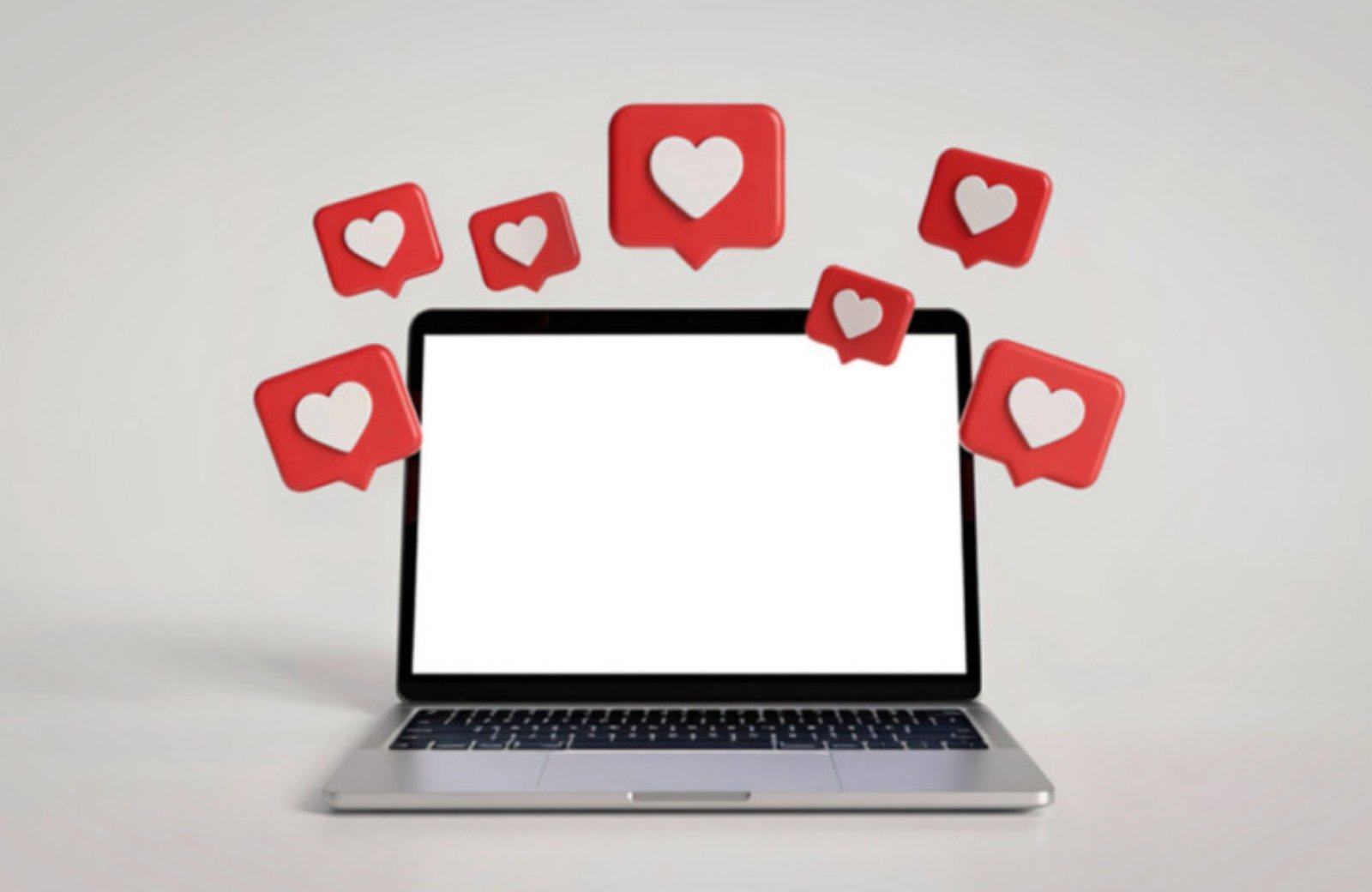 Laptop surrounded by social media like icons, illustrating a small business social media strategy